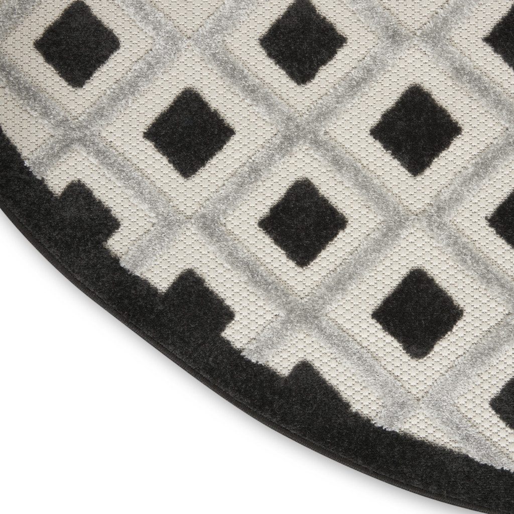 5′ Black and White Indoor Outdoor Round Rug