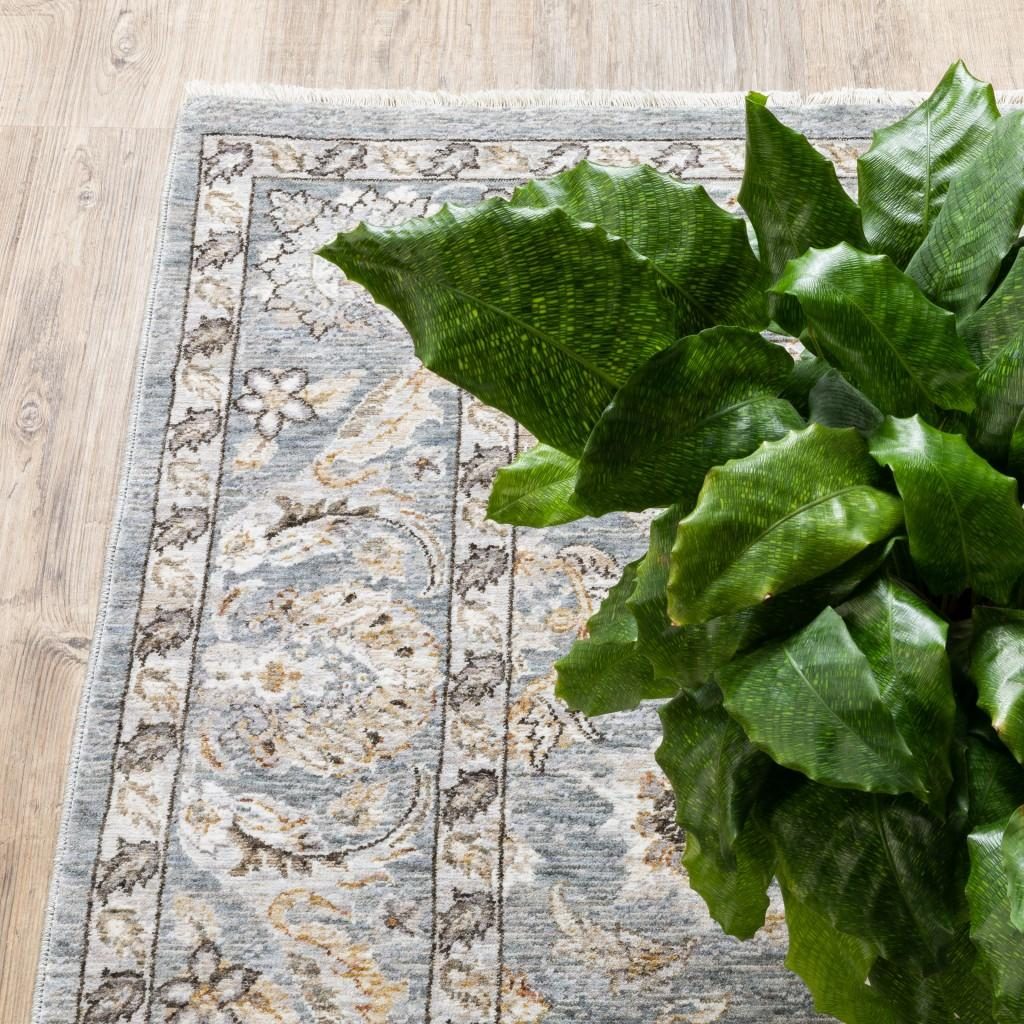 10′ X 13′ Blue and Ivory Distressed Oriental Area Rug