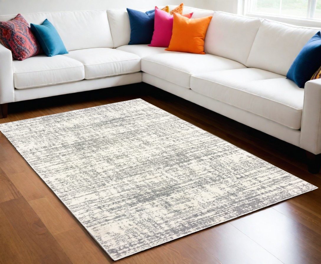 8′ X 11′ Ivory And Gray Abstract Strokes Area Rug