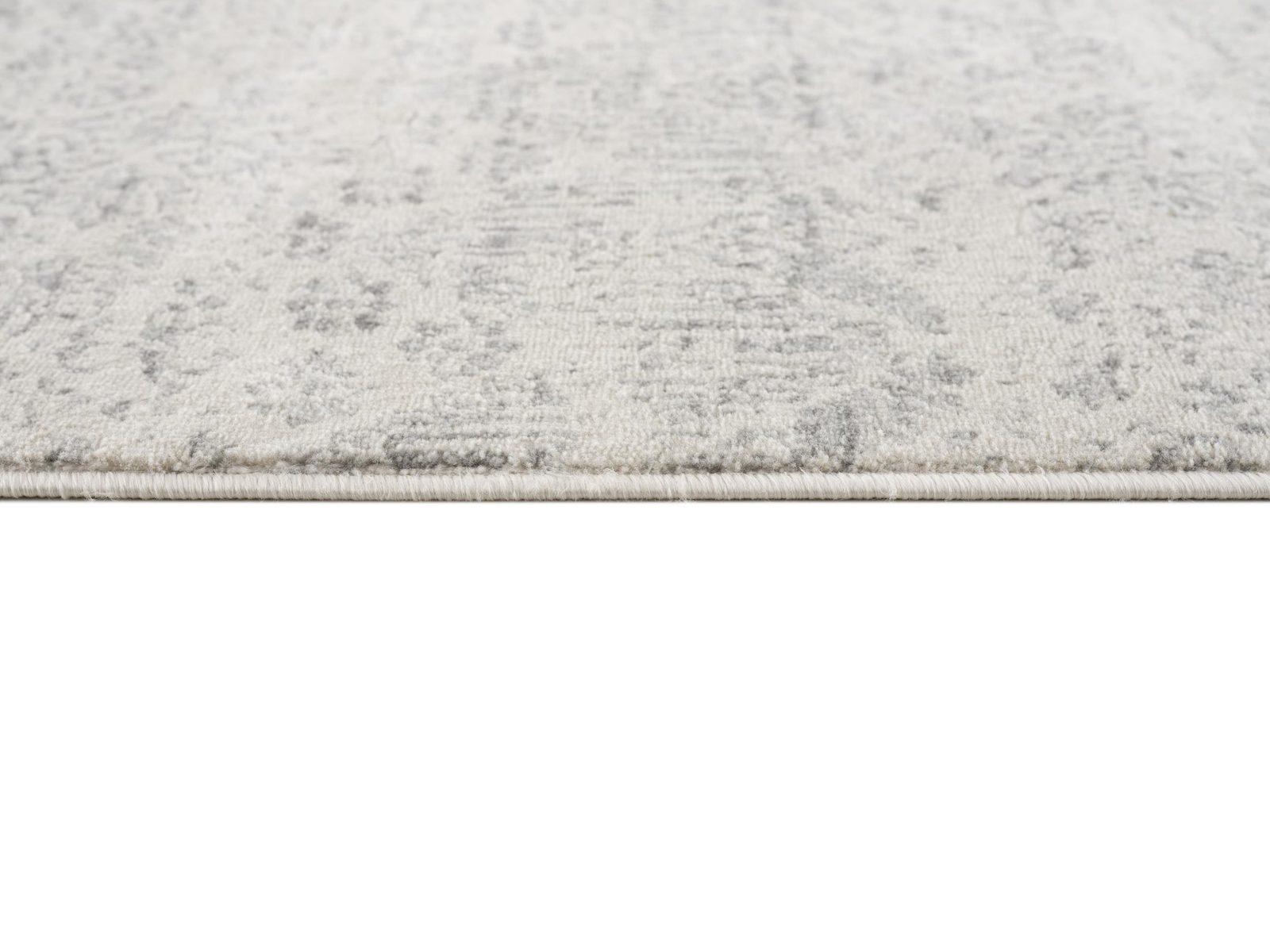 2′ X 6′ Ivory Distressed Ikat Pattern Area Rug