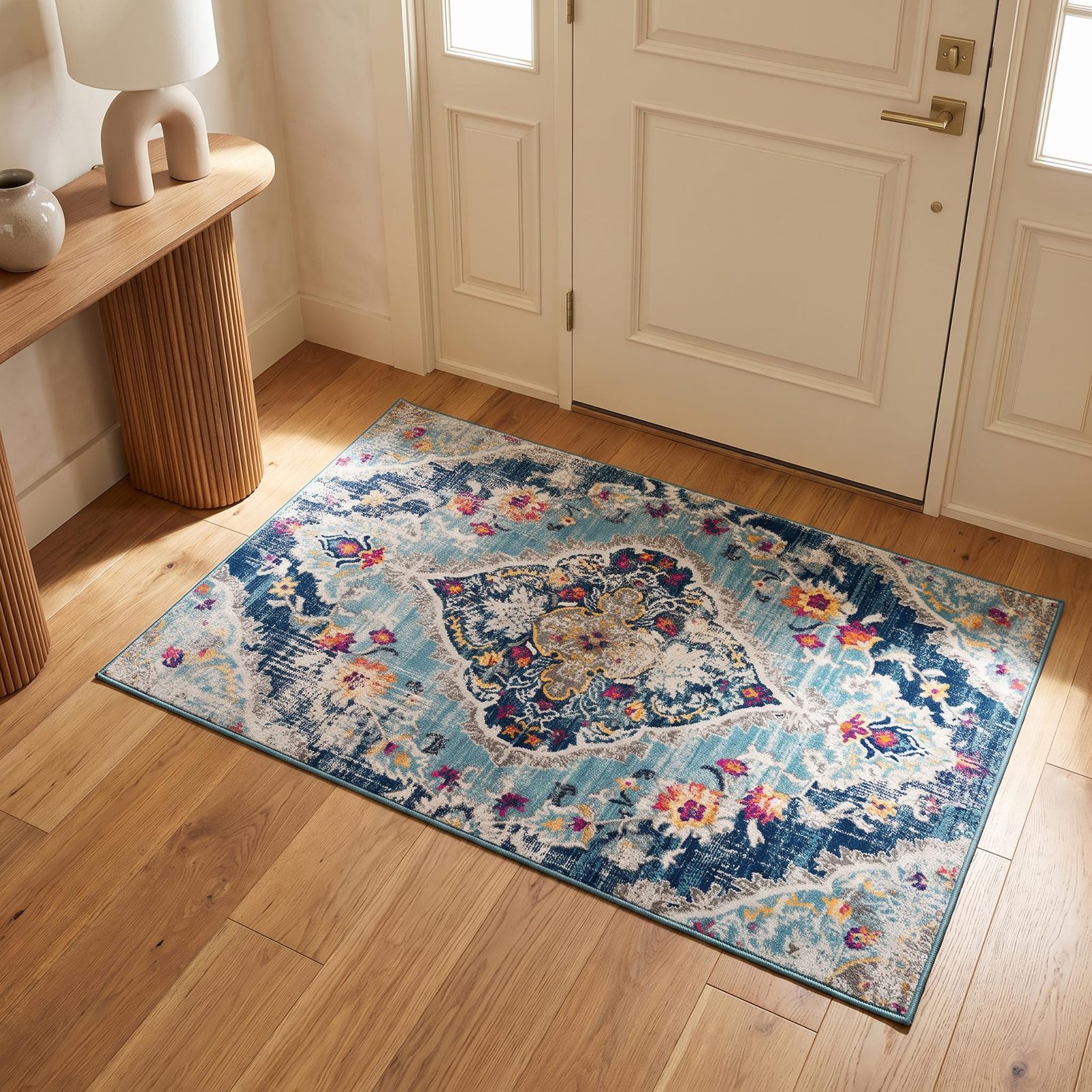 Blue and Ivory Polypropylene Medallion Area Rug, 2′ × 4′