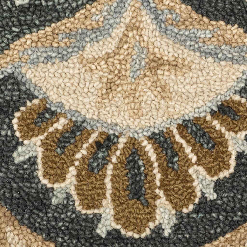 6′ Black and Tan Round Wool Floral Medallion Rug
