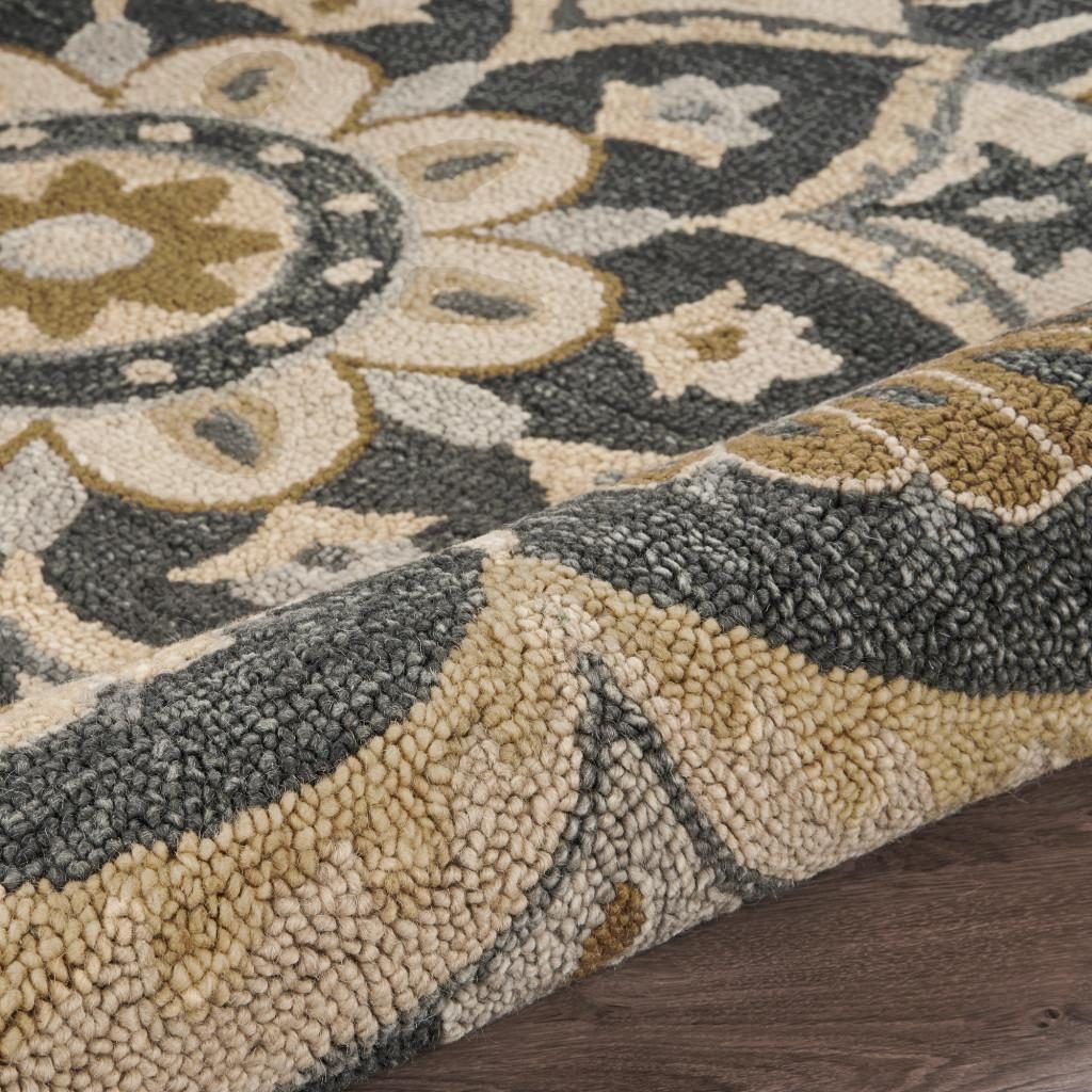 6′ Black and Tan Round Wool Floral Medallion Rug