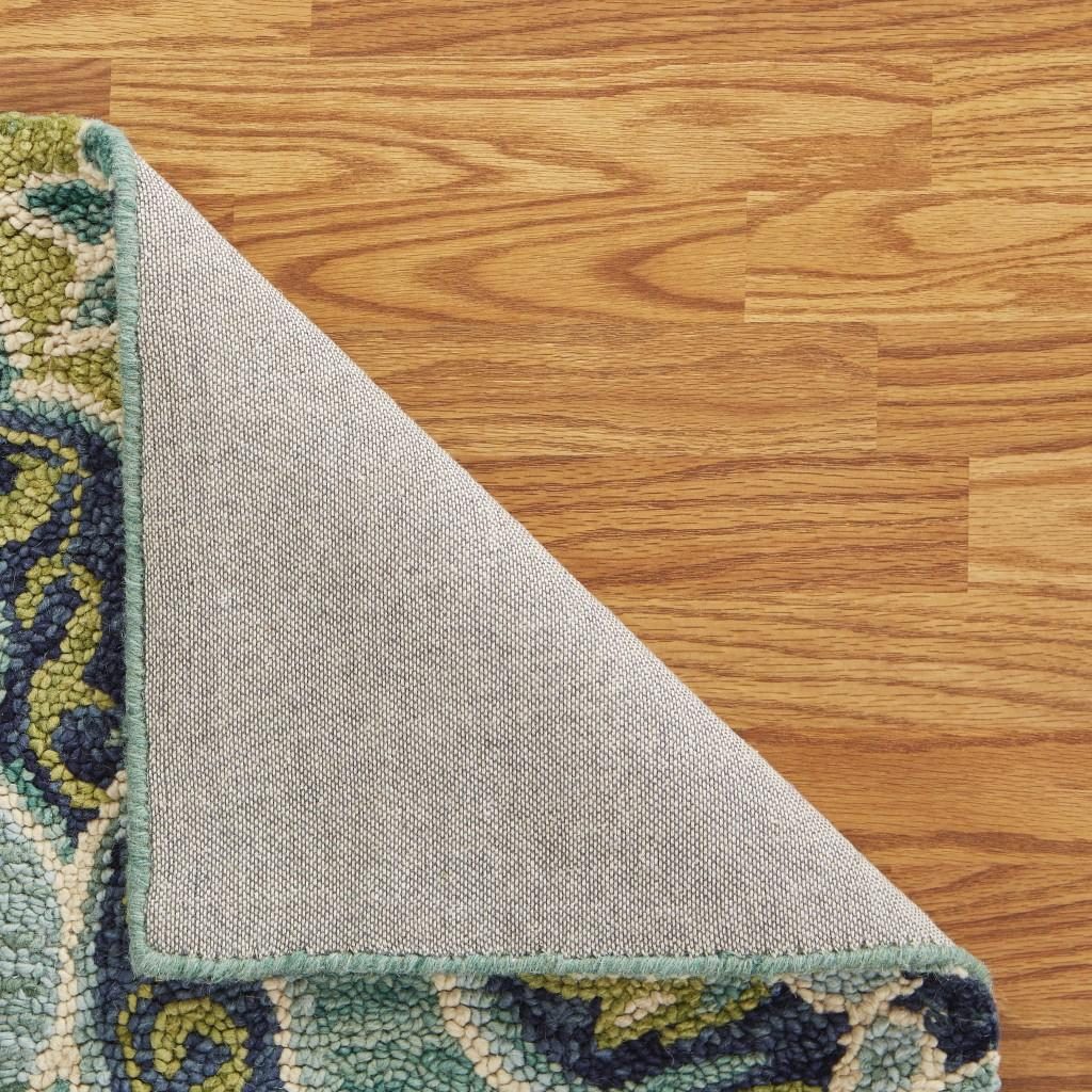 6′ Green and Ivory Wool Geometric Hand Tufted Round Rug
