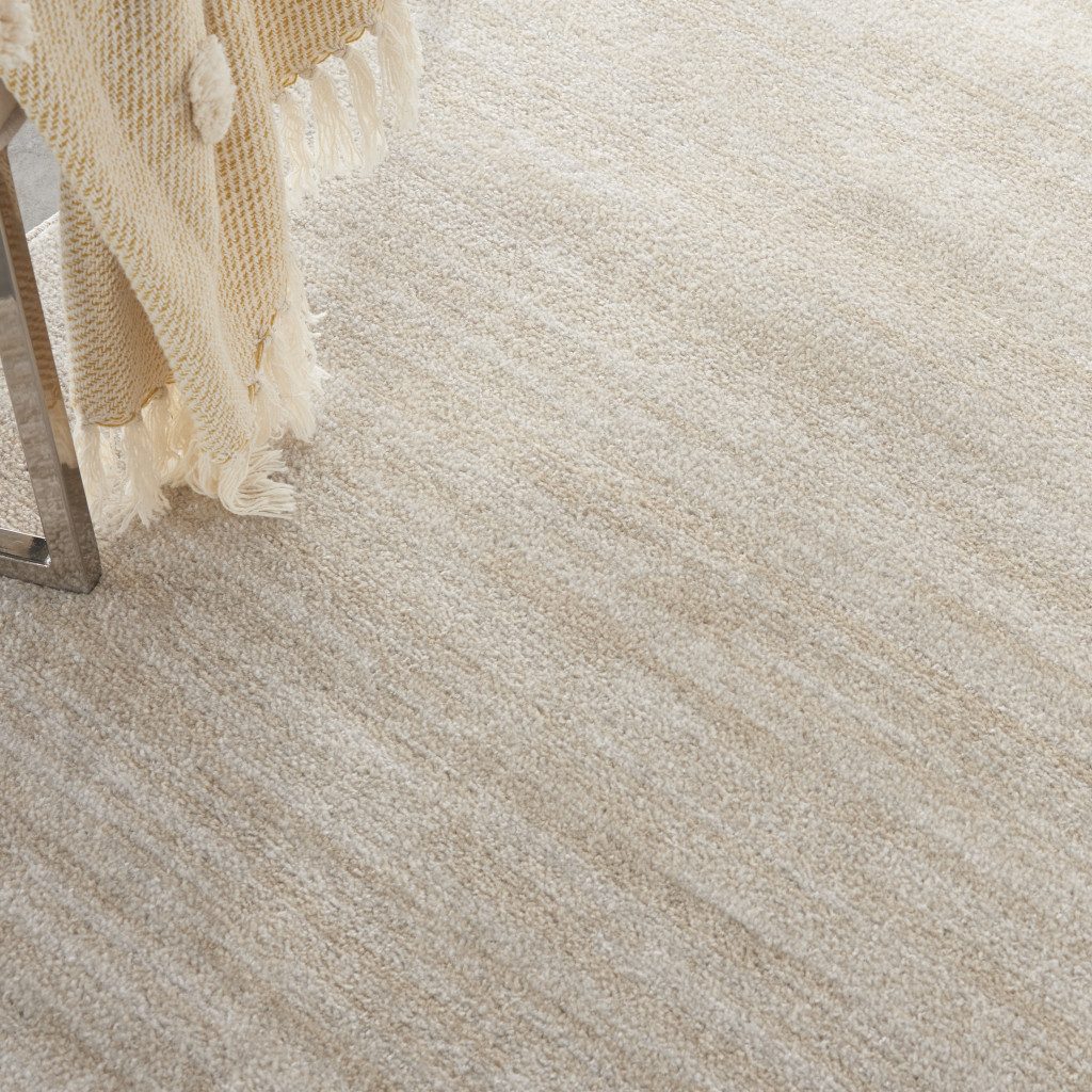 7′ Beige and Ivory Square Indoor Outdoor Area Rug
