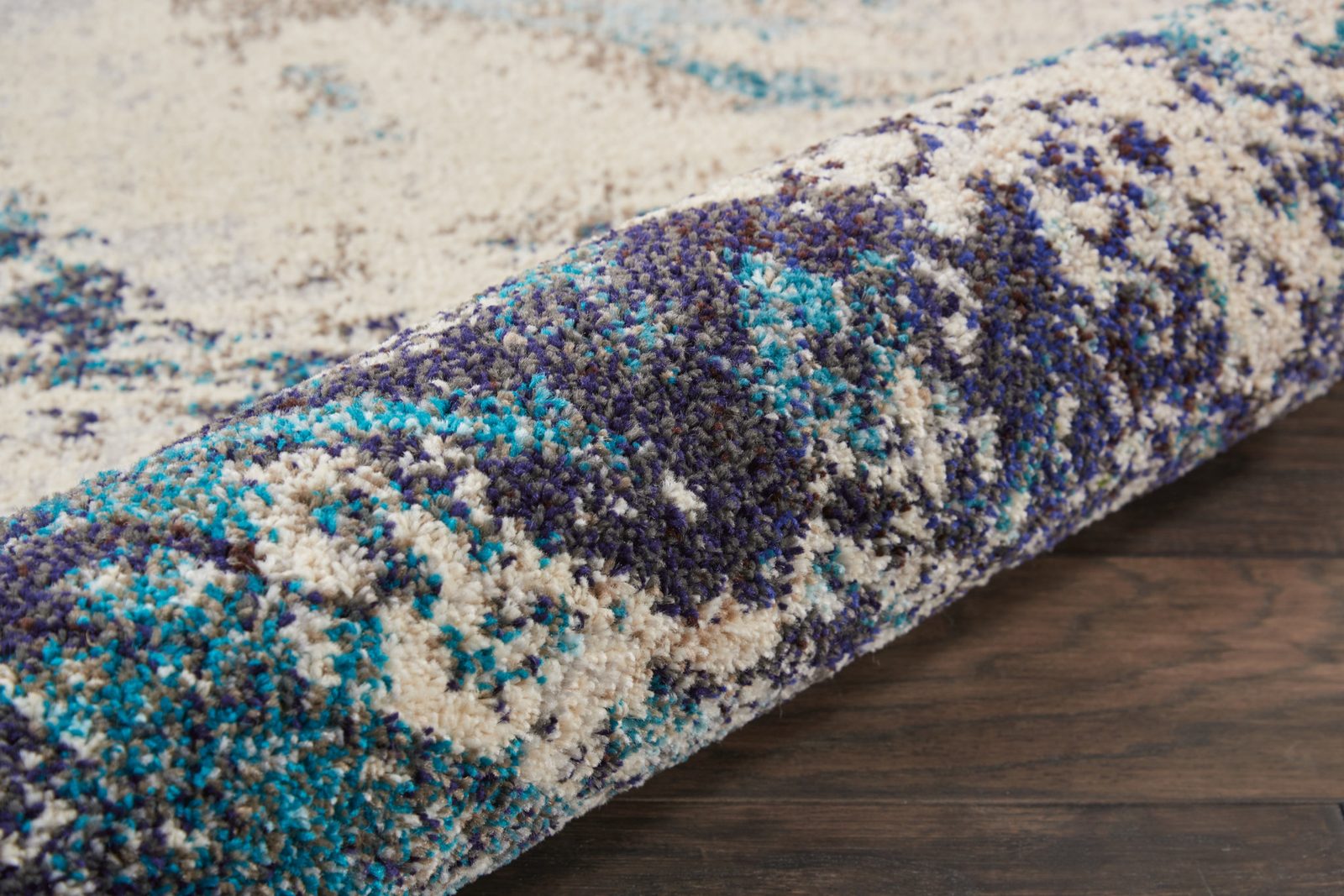 Ivory and Teal Blue Abstract Polypropylene Area Rug