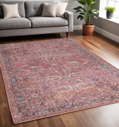 5′ X 7′ Pink And Blue Oriental Distressed Area Rug