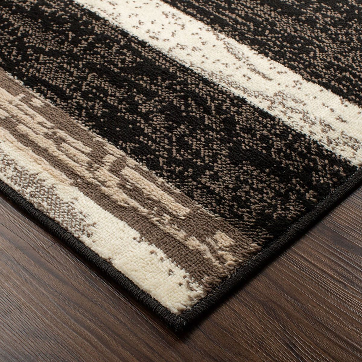 Black Brown And Beige Patchwork Polypropylene Area Rug