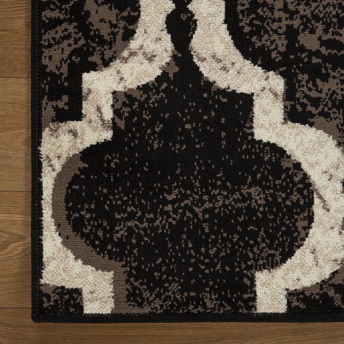 5′ Brown Black and Ivory Quatrefoil Distressed Square Rug