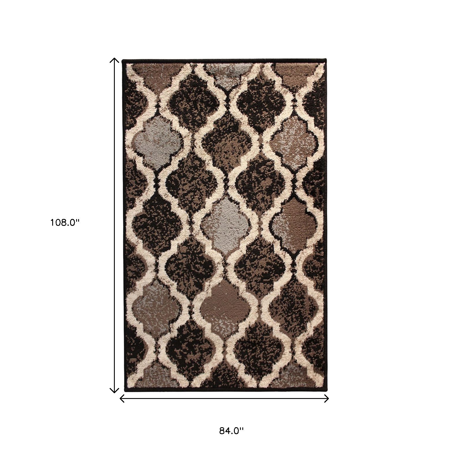 7′ X 9′ Brown Black Ivory Quatrefoil Distressed Area Rug