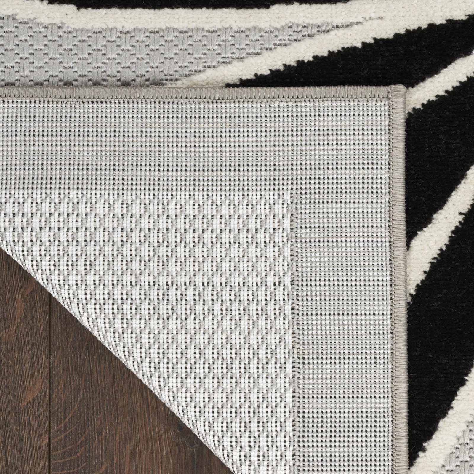 8′ X 11′ Black and White Floral Area Rug