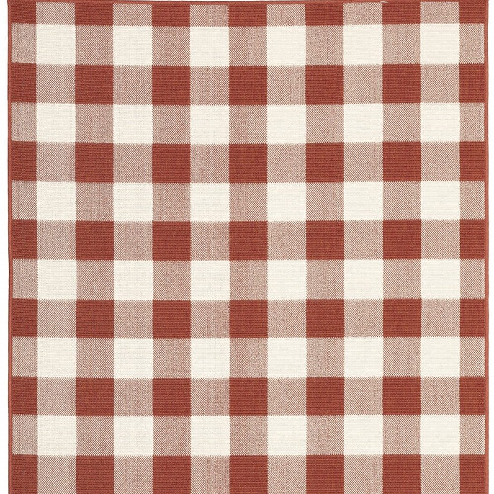 7′ X 10′ Red and Ivory Geometric Area Rug
