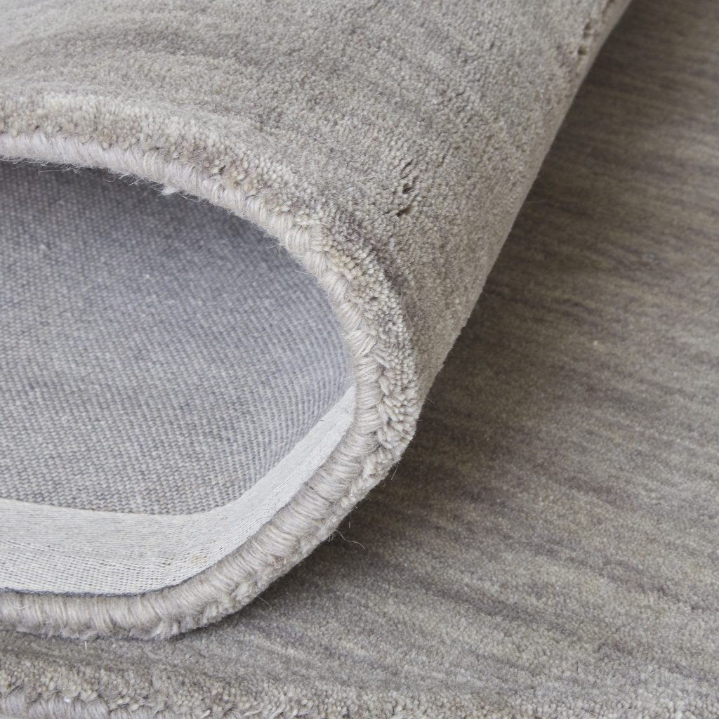 5′ X 8′ Gray and Ivory Wool Area Rug