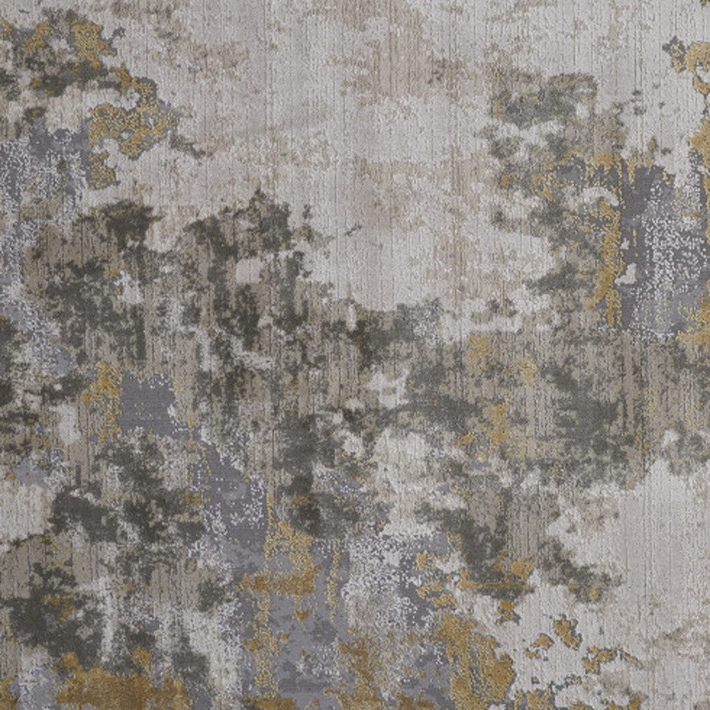 7′ X 10′ Ivory Gray And Gold Abstract Area Rug