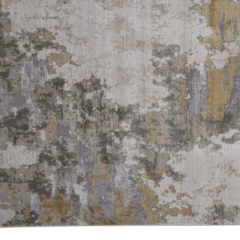 7′ X 10′ Ivory Gray And Gold Abstract Area Rug