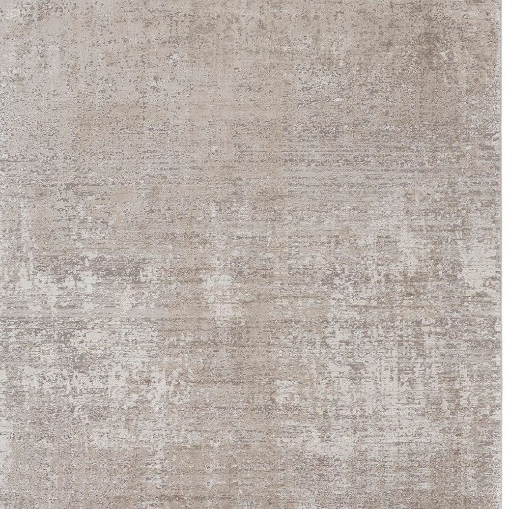 12′ X 15′ Tan Ivory Abstract Distressed Fringe Area Rug