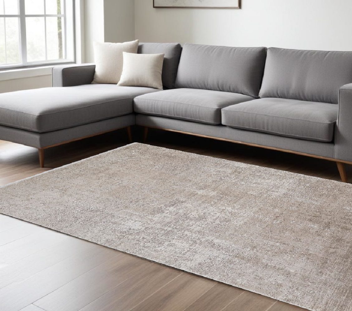 12′ X 15′ Tan Ivory Abstract Distressed Fringe Area Rug