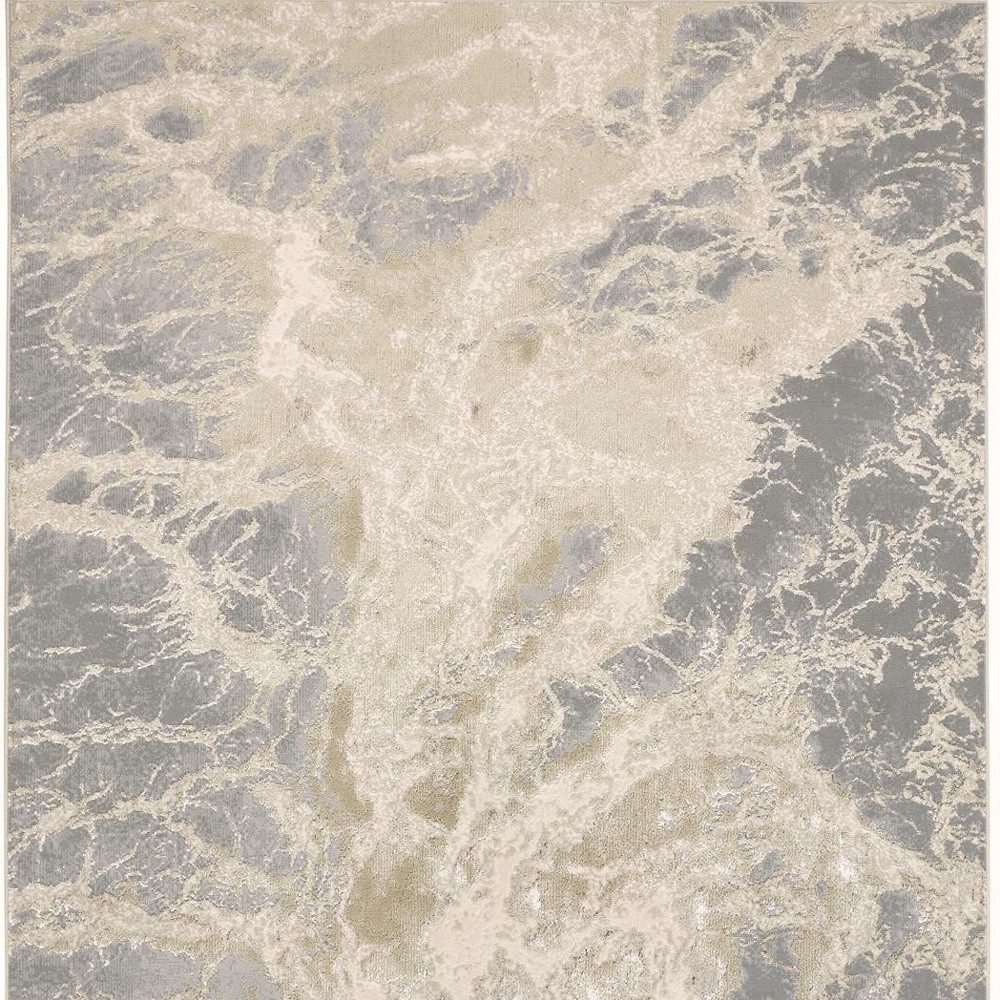 7′ X 10′ Ivory Tan And Gray Abstract Area Rug