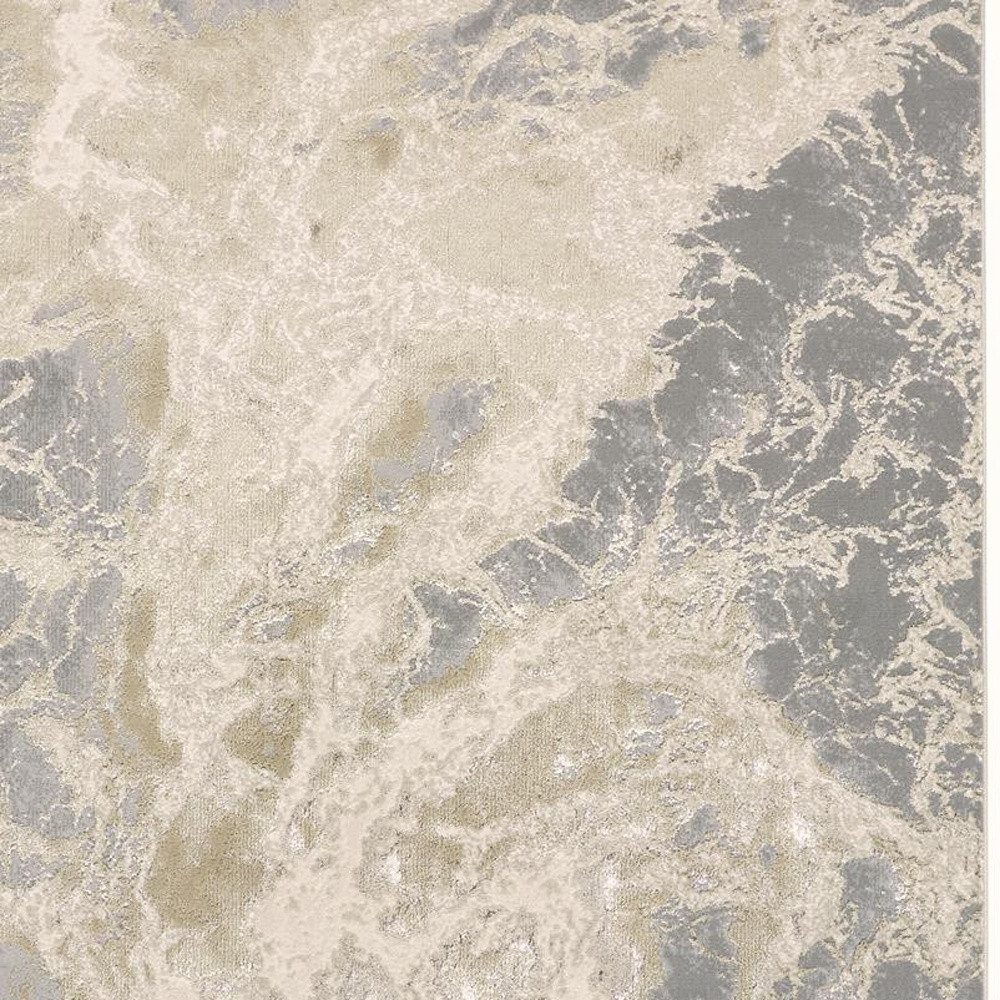 7′ X 10′ Ivory Tan And Gray Abstract Area Rug
