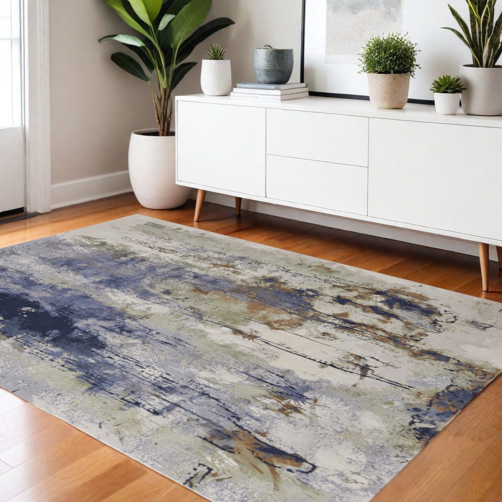 4′ X 6′ Blue Orange and Ivory Abstract Area Rug