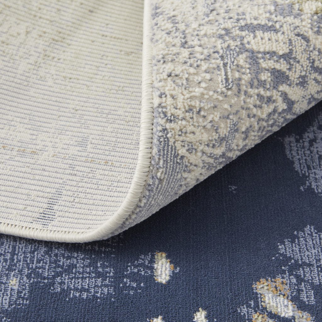 9′ X 12′ Blue Orange And Ivory Abstract Area Rug