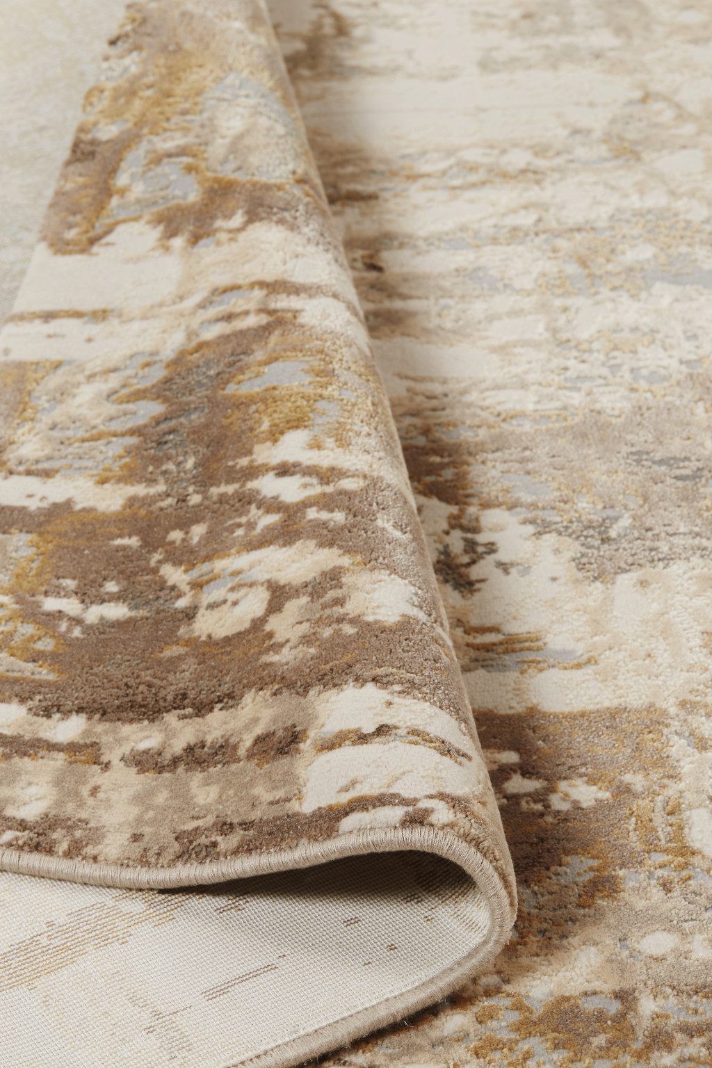9′ X 12′ Tan Ivory And Gray Abstract Area Rug