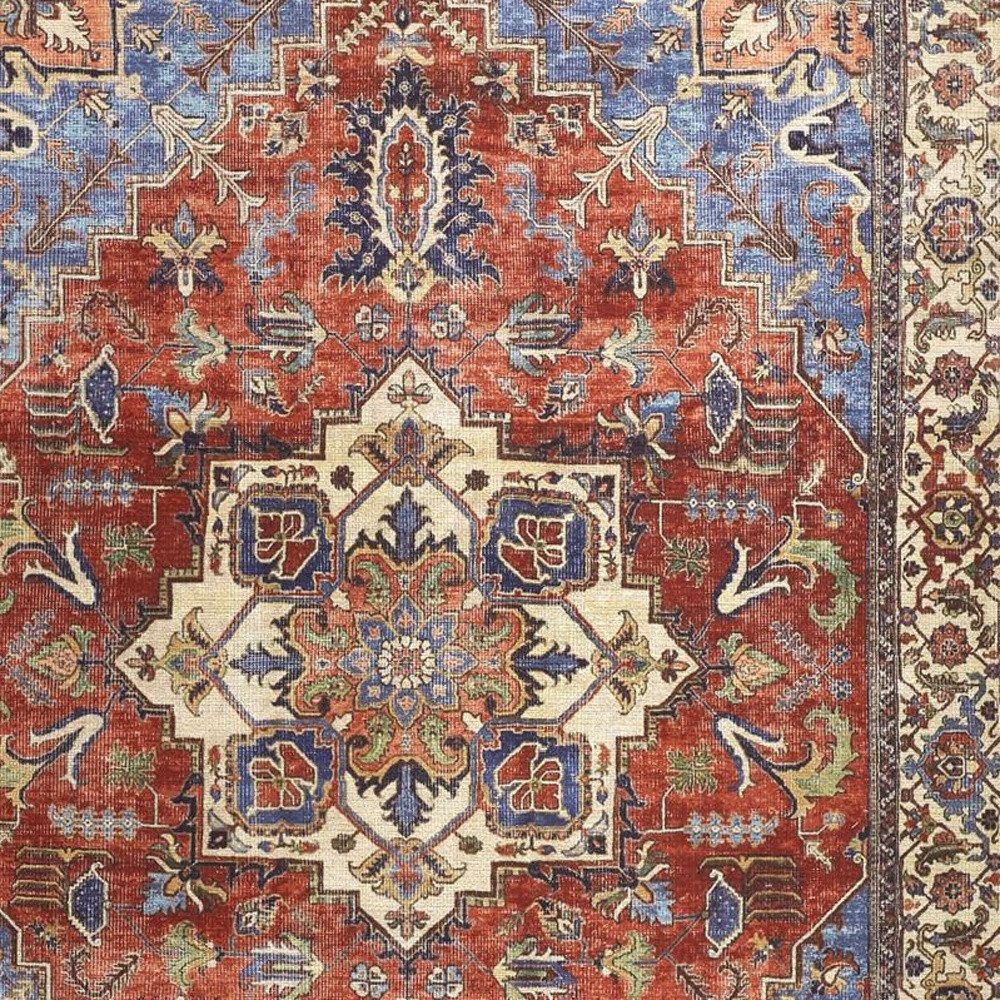 5′ X 8′ Blue And Orange Floral Medallion Area Rug