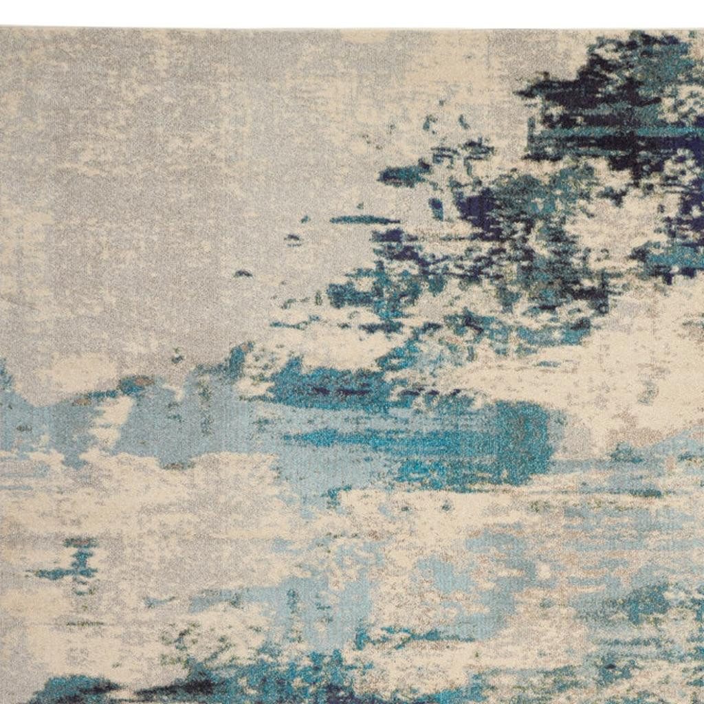 10′ X 14′ Ivory Abstract Power Loom Area Rug