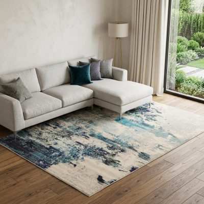 7′ X 10′ Ivory Abstract Power Loom Area Rug