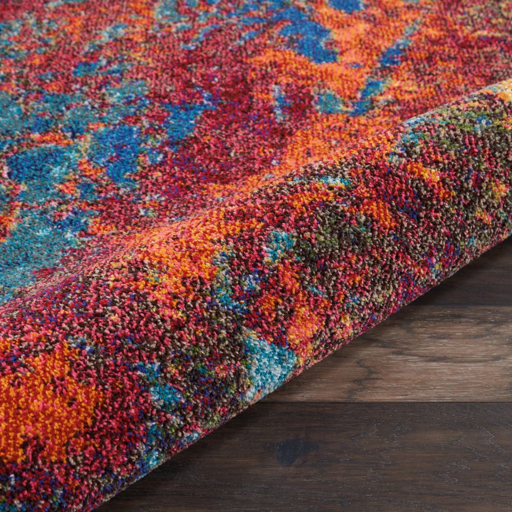 7′ X 10′ Blue and Orange Abstract Area Rug