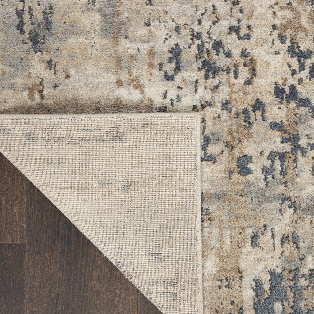 6′ X 9′ Beige Abstract Power Loom Area Rug