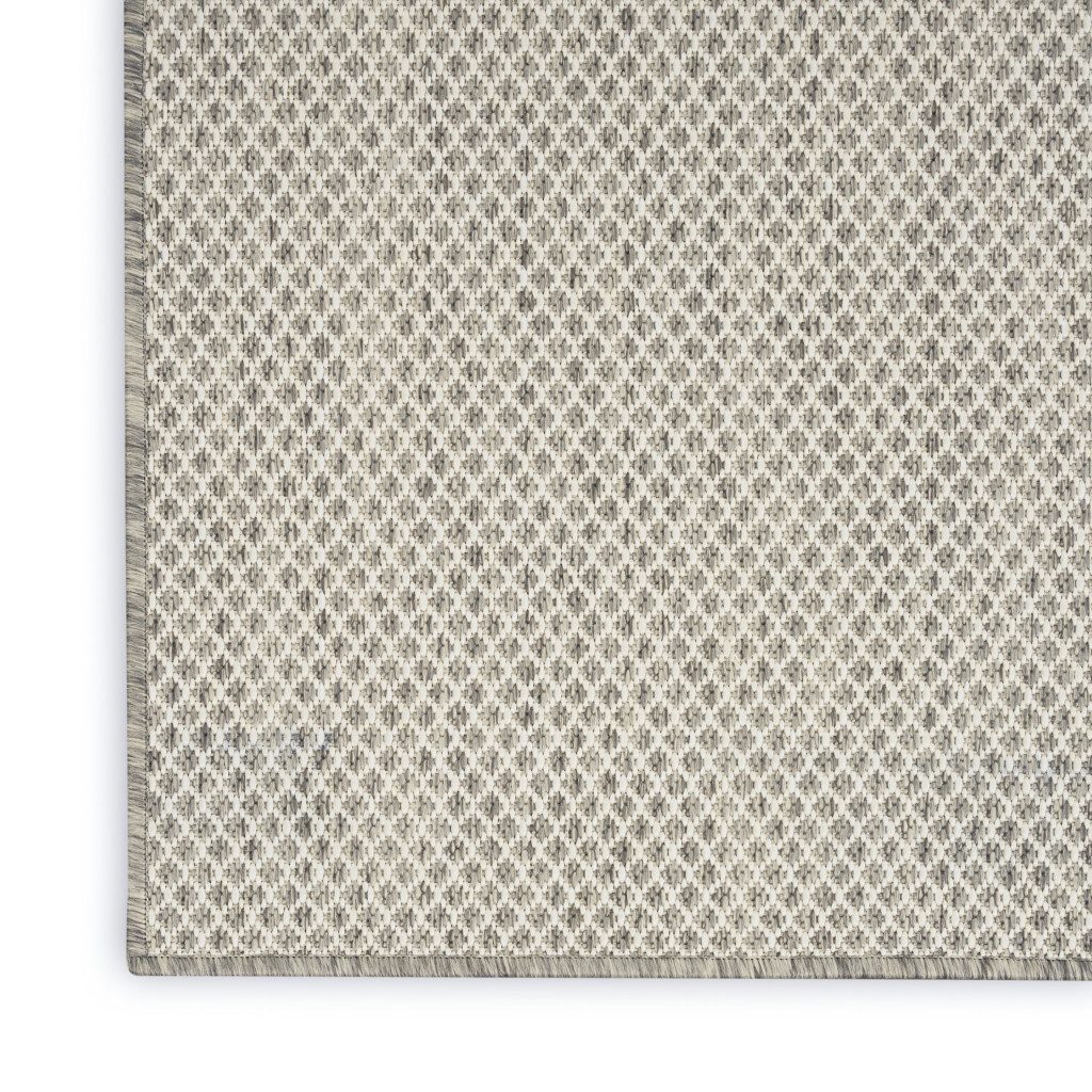 10′ X 14′ Ivory and Silver Indoor Outdoor Area Rug