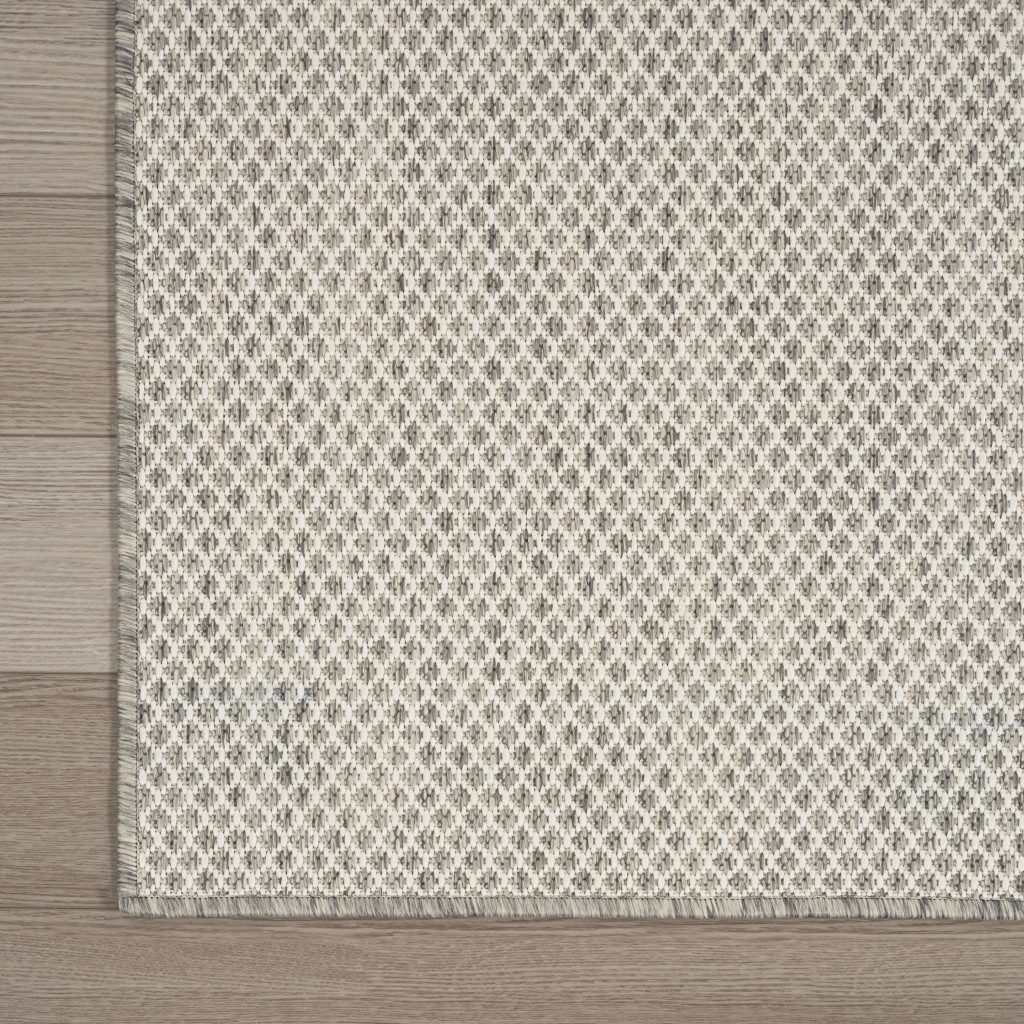 10′ X 14′ Ivory and Silver Indoor Outdoor Area Rug
