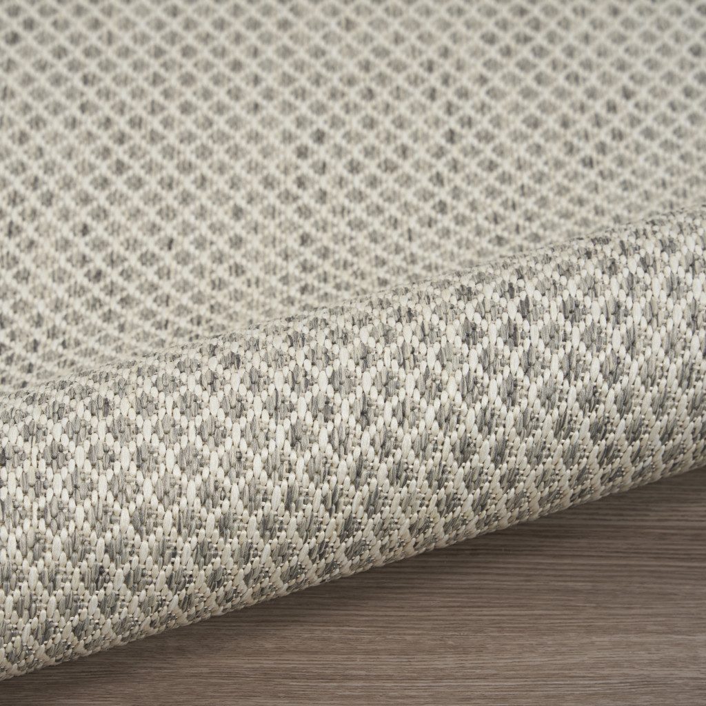 10′ X 14′ Ivory and Silver Indoor Outdoor Area Rug