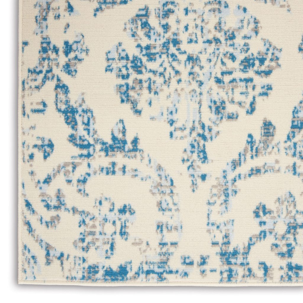 5′ X 7′ Ivory And Blue Damask Area Rug