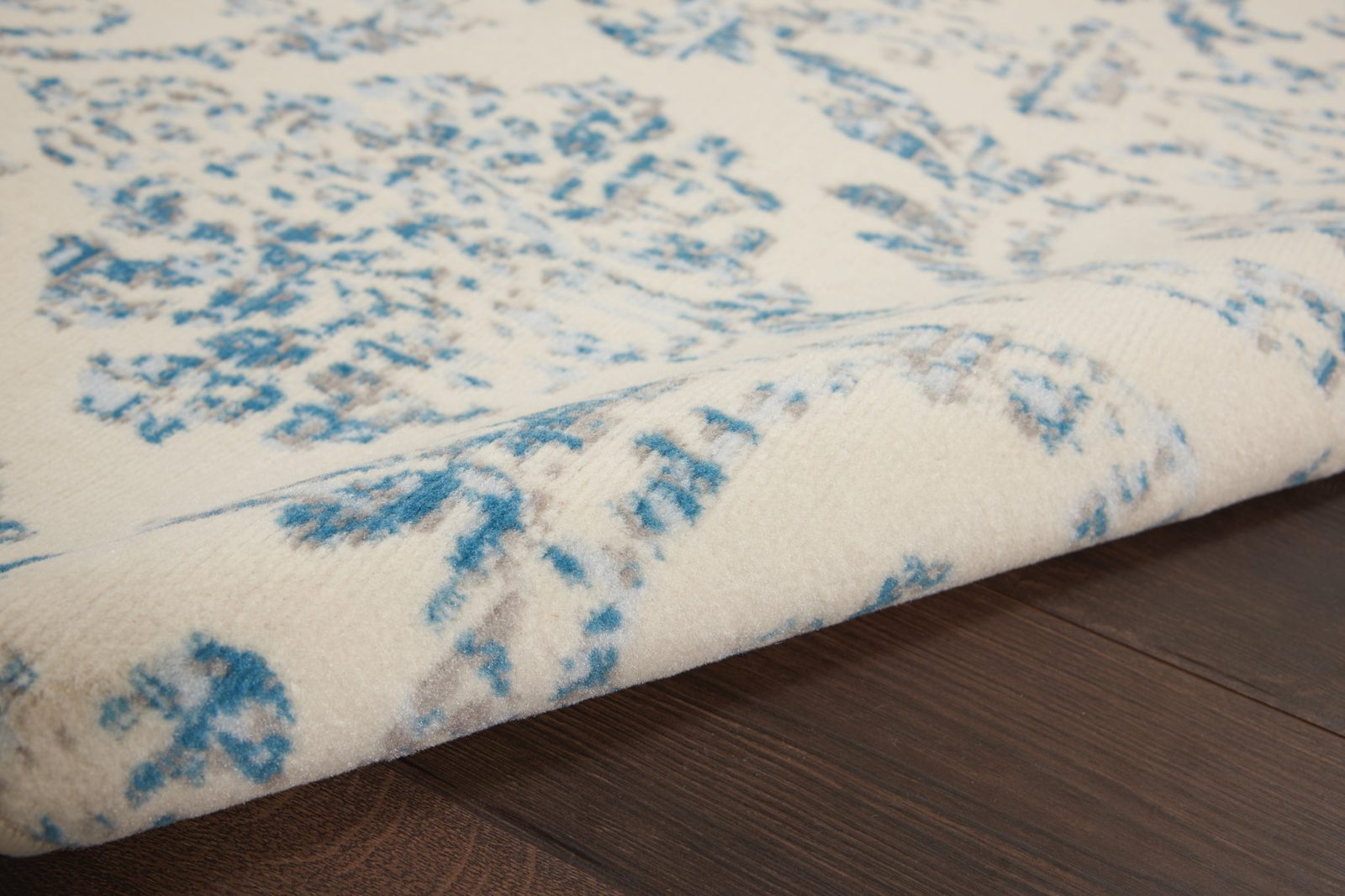 5′ X 7′ Ivory And Blue Damask Area Rug