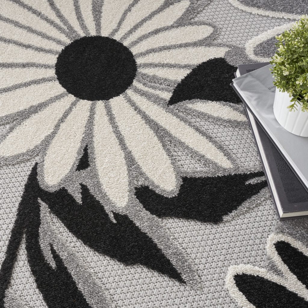 8′ Black and White Floral Indoor Outdoor Round Rug