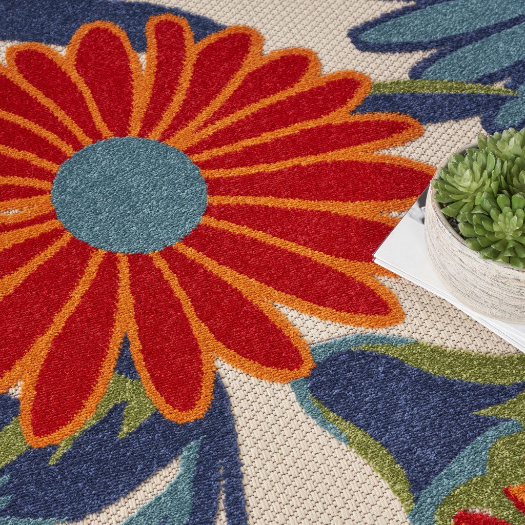 8′ Ivory Orange and Blue Floral Indoor Outdoor Round Rug