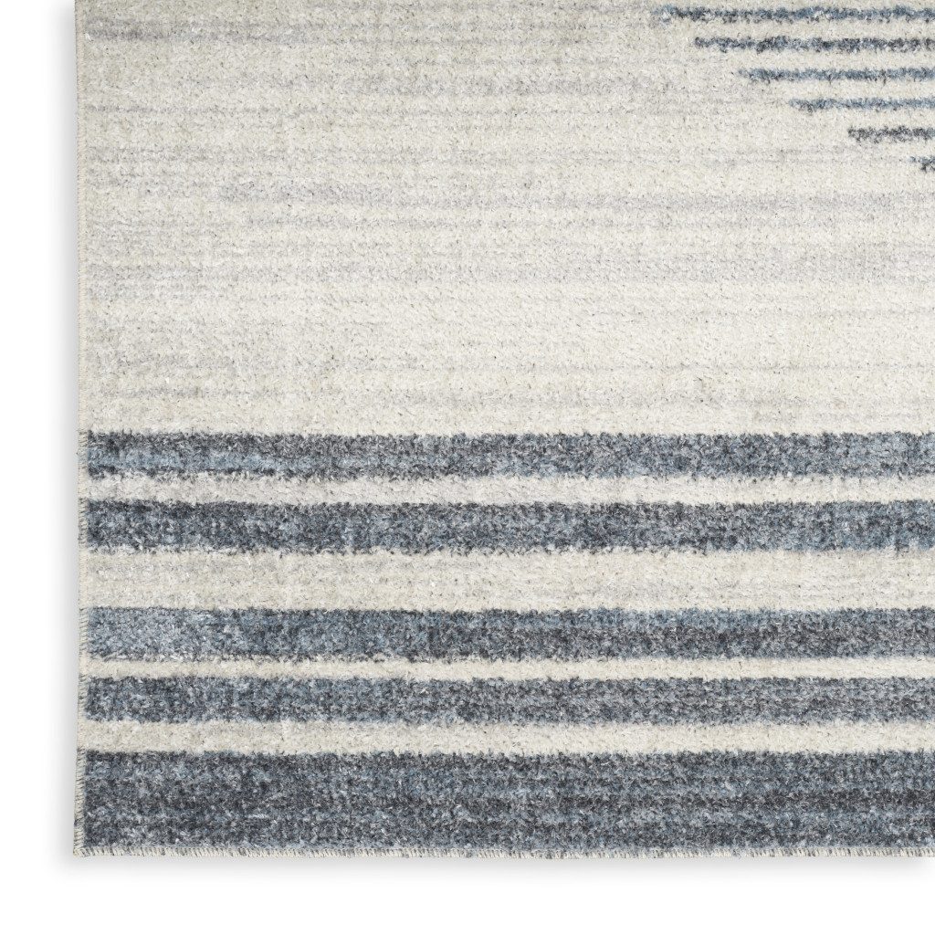 3′ X 5′ Blue and Ivory Geometric Washable Area Rug