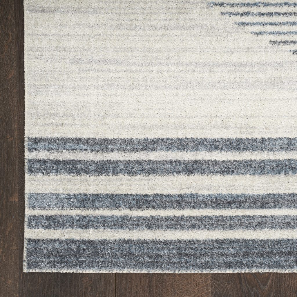 3′ X 5′ Blue and Ivory Geometric Washable Area Rug