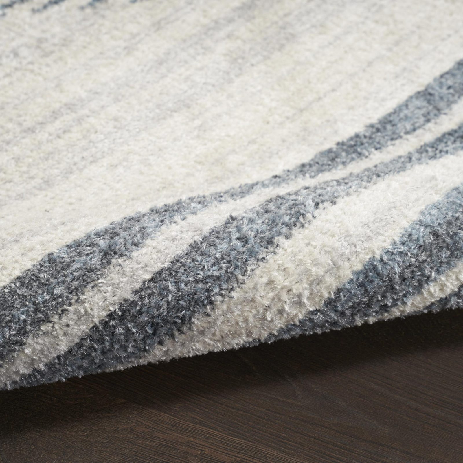 4′ X 6′ Blue and Ivory Geometric Washable Area Rug