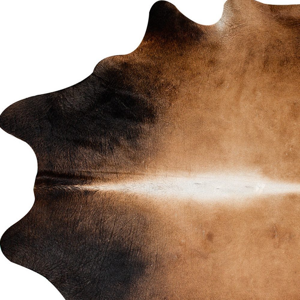 5′ X 7′ Dark Brown and Tan Cowhide Area Rug