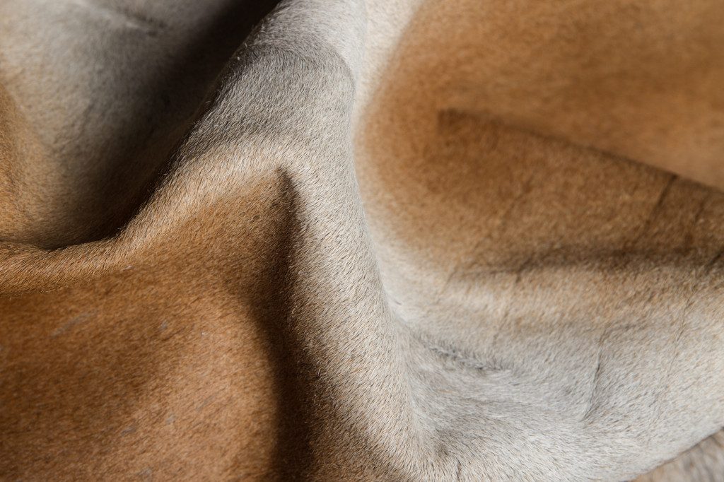 5′ X 7′ Dark Brown and Tan Cowhide Area Rug