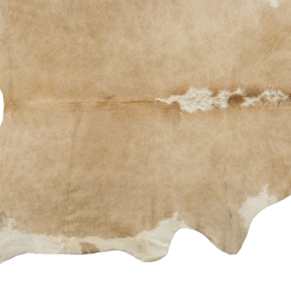 5′ X 7′ Brown and White Cowhide Area Rug V