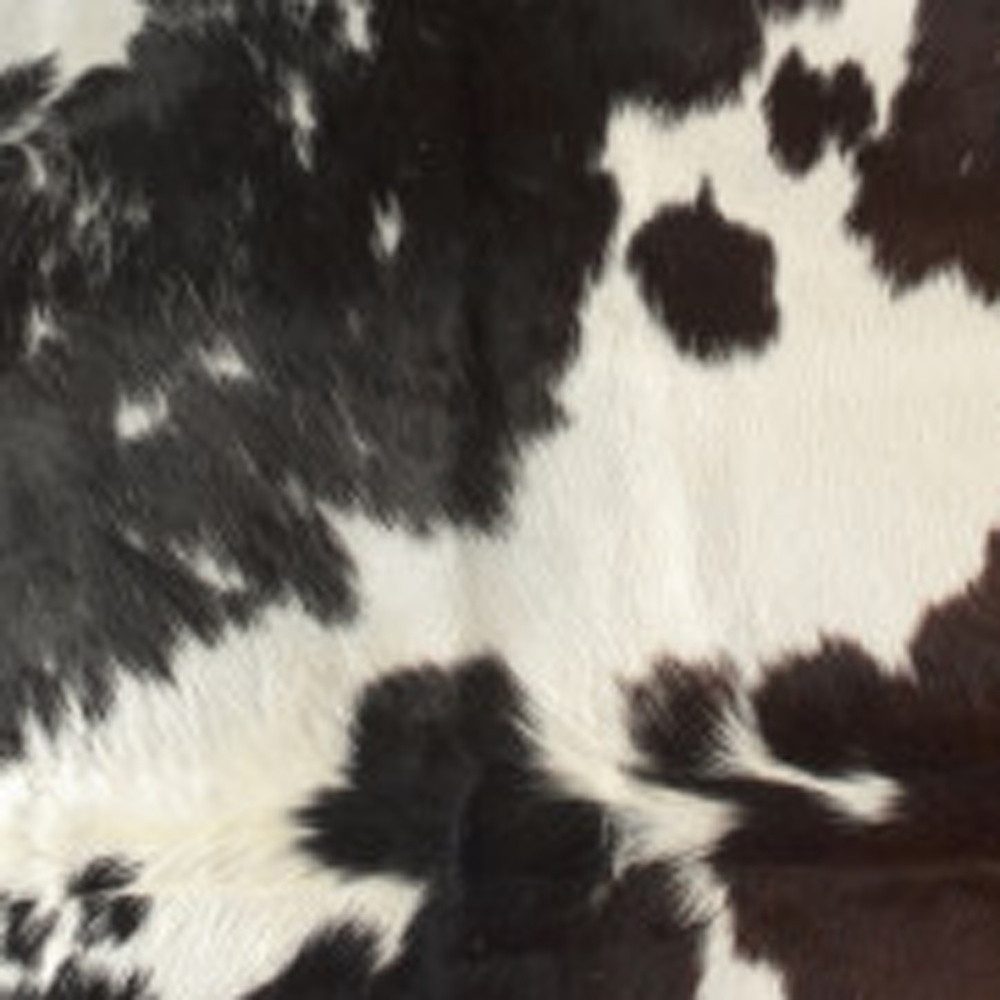 6′ X 7′ Brown Black and White Cowhide Area Rug