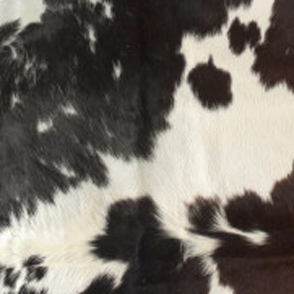 6′ X 7′ Brown Black and White Cowhide Area Rug