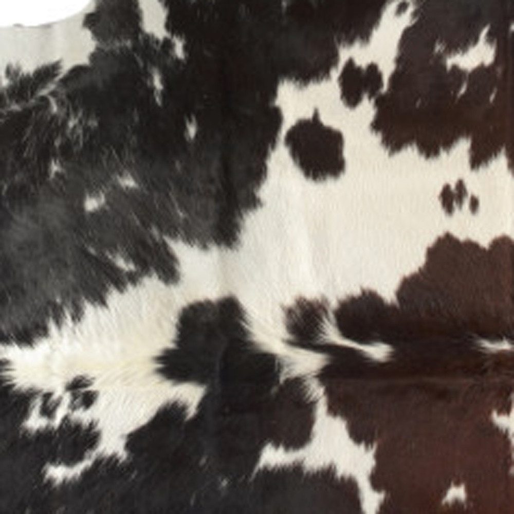6′ X 7′ Brown Black and White Cowhide Area Rug