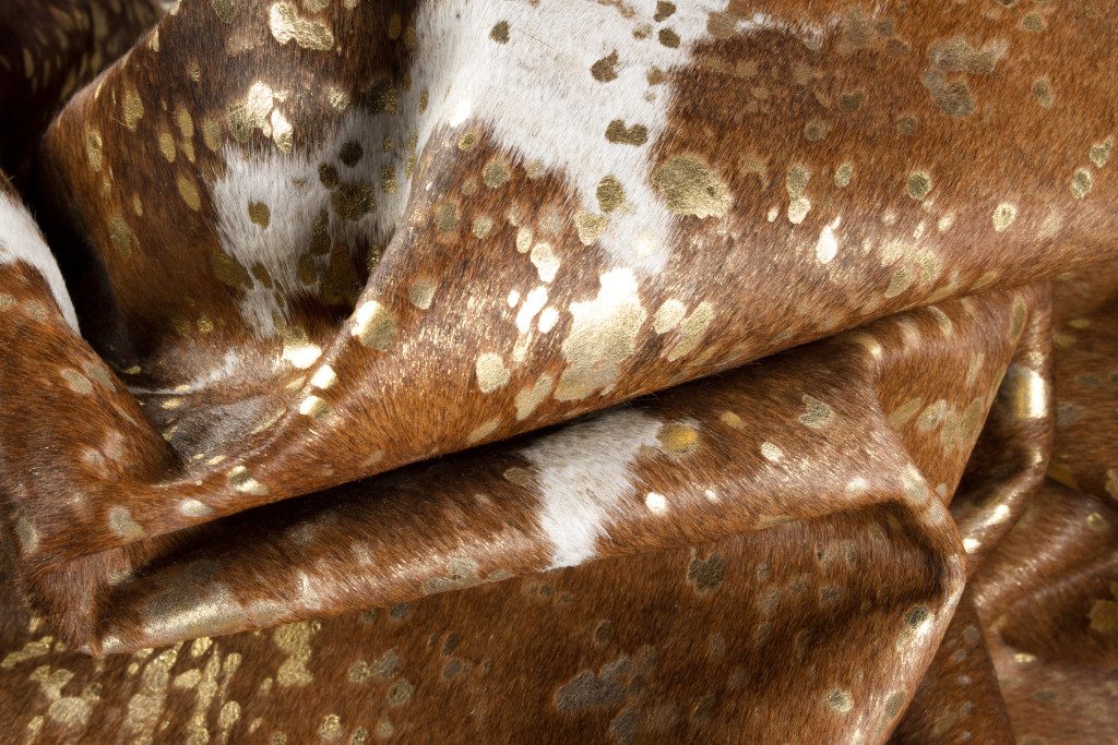 5′ X 7′ Brown and White Cowhide Area Rug III