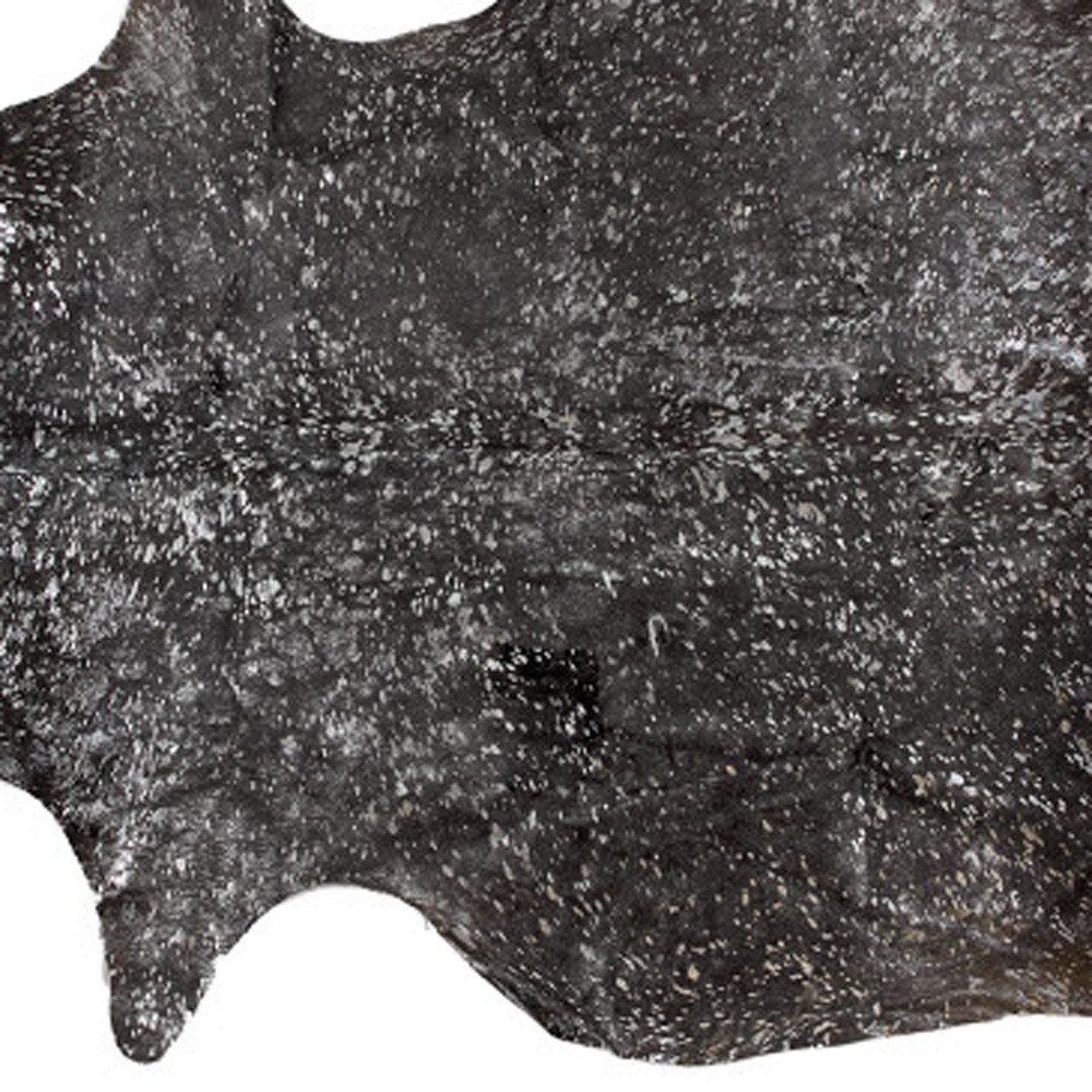 5′ X 7′ Brown and Silver Cowhide Area Rug