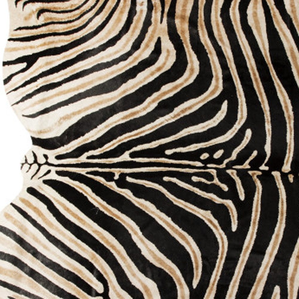 5′ X 7′ Brown and Black Cowhide Area Rug